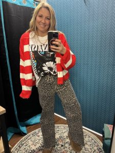 Ashley giving style inspiration with a graphic tee and leopard risen jeans