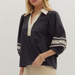 Side View of Black and Cream Scallops Top from Ashley B's Boutique